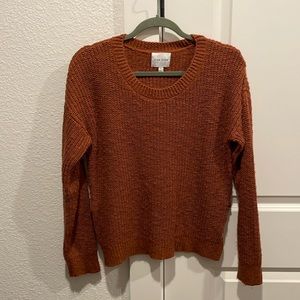 Pink rose sweater with detail on the side